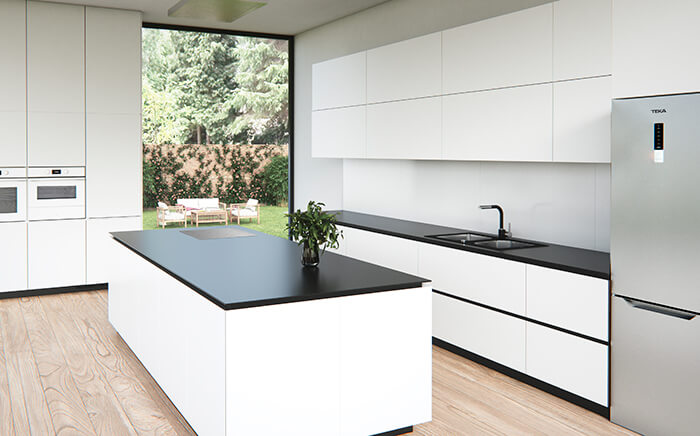 cocina blanca con encimeras negras
