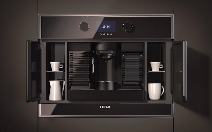 cafetera integrada teka con compartimentos abiertos para almacenar tazas y jarras