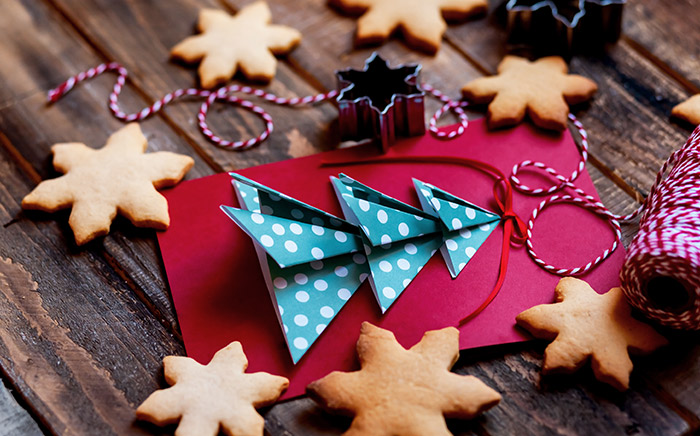 Christmas cards surrounded by cookies