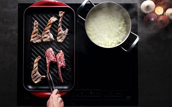 Cooking Christmas lamb recipe on a hob