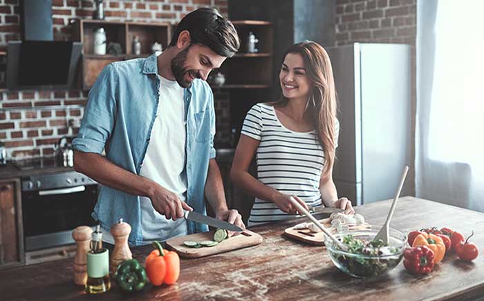 the importance of social eating with two friends or perhaps siblings, who knows, or a man and a woman just cooking together in a kitchen