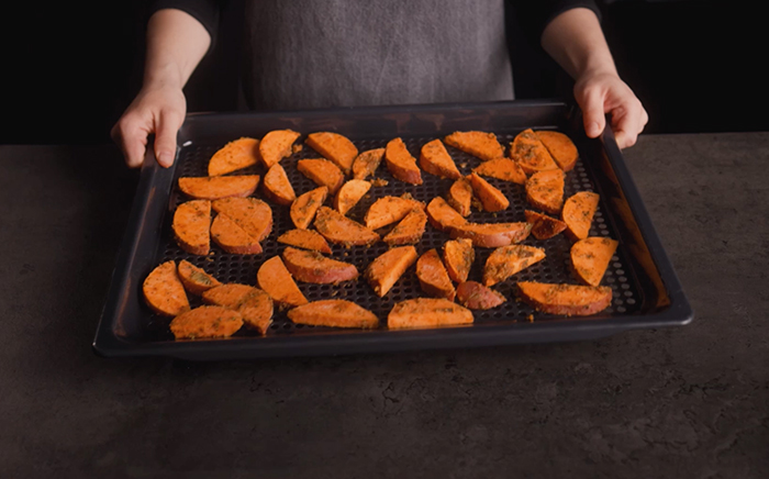 Sweet potato cut into wedges and serve on Teka's AirFry oven tray