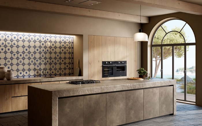 An open-concept wooden kitchen with a central island, featuring a sleek black Teka Maestropizza oven seamlessly built into the cabinets