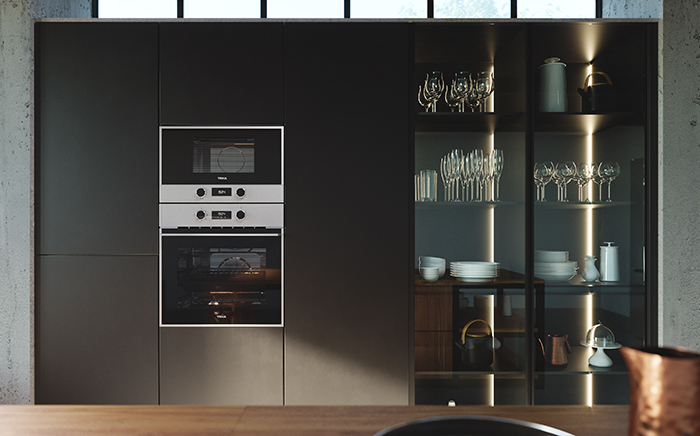 Built-in microwave and oven in a column by Teka in a kitchen with a stainless steel finish.