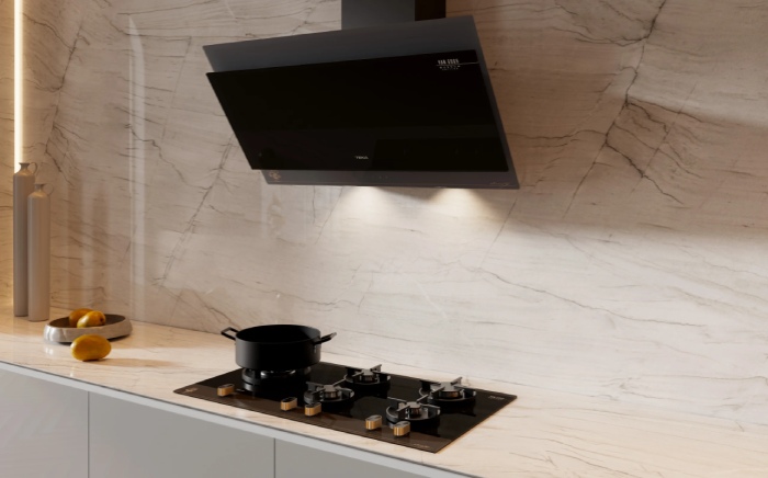 Teka's Van Gogh Museum Edition decorative hood on a white and marble wall with Van Gogh Museum edition gas hob