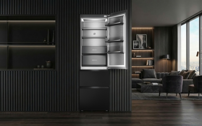 A megacombi fridge freezer by Teka with doors open in a modern kitchen
