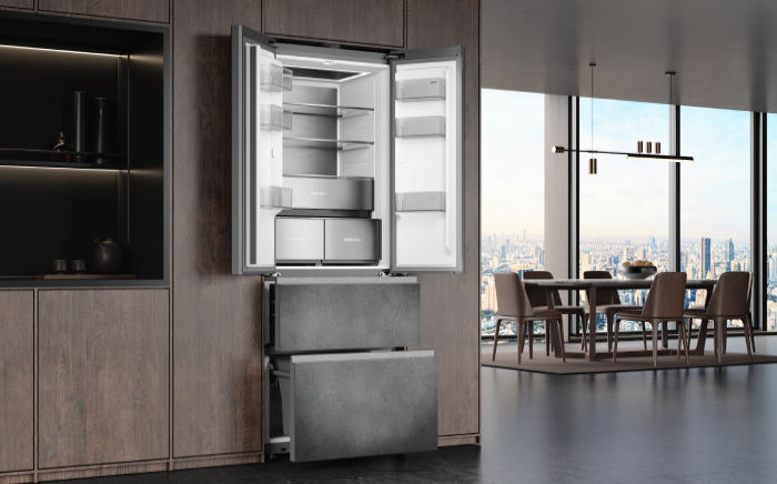 In-Line, slot-in Teka's fridge freezer with open doors and pull-out freezer drawers in a modern kitchen.