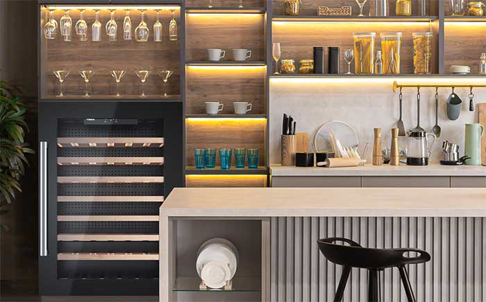 Kitchen with black cabinet and a wine cooler