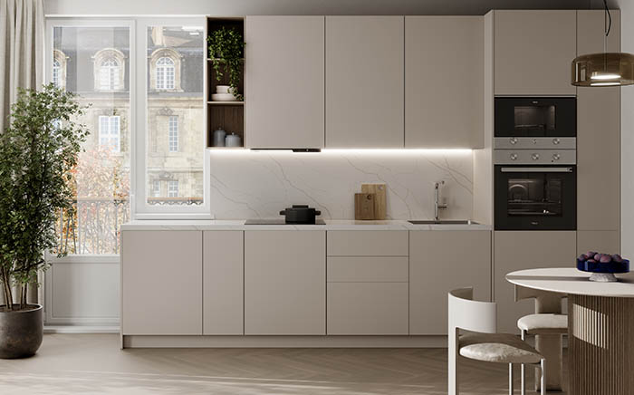 White contemporary kitchen with Teka home appliances and a window on the left side with a parisian neo classic buildings view